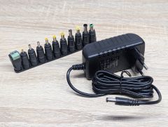 Новий Універсальний блок живлення AC/DC 15V з набором змінних роз'ємів