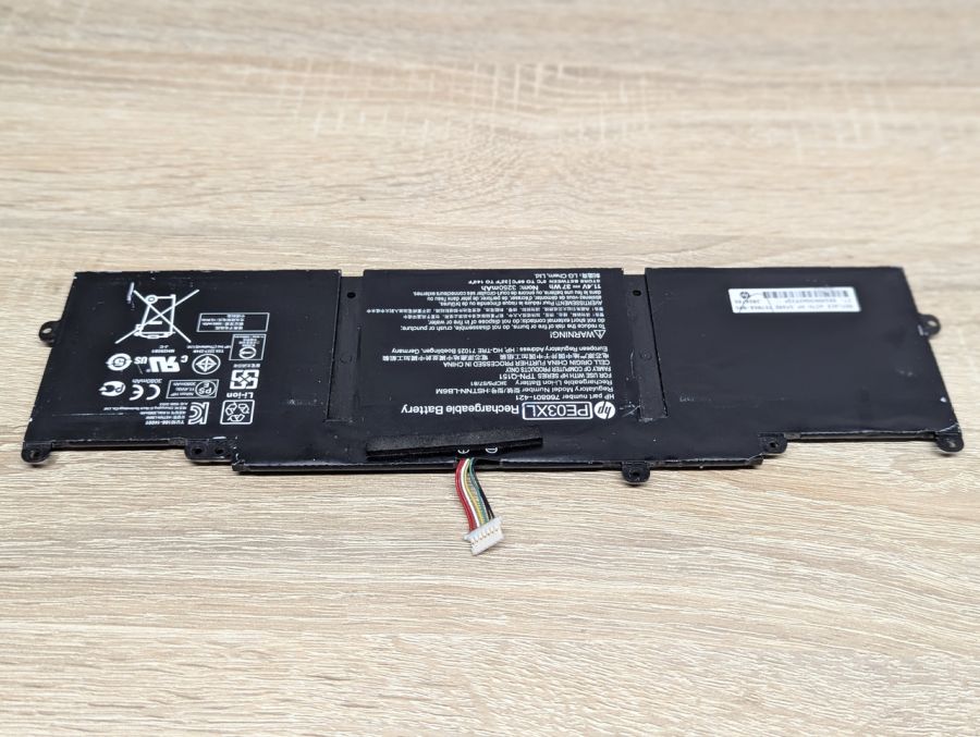 Б/В Оригінальна акумуляторна батарея HP PE03XL