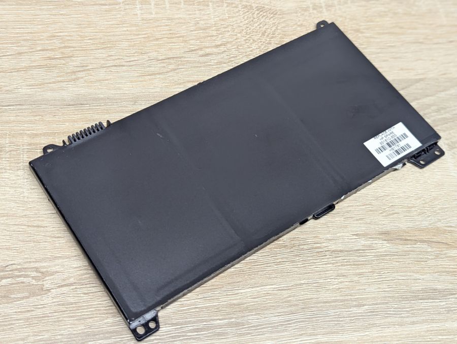 Б/В Оригінальна акумуляторна батарея HP RR03XL