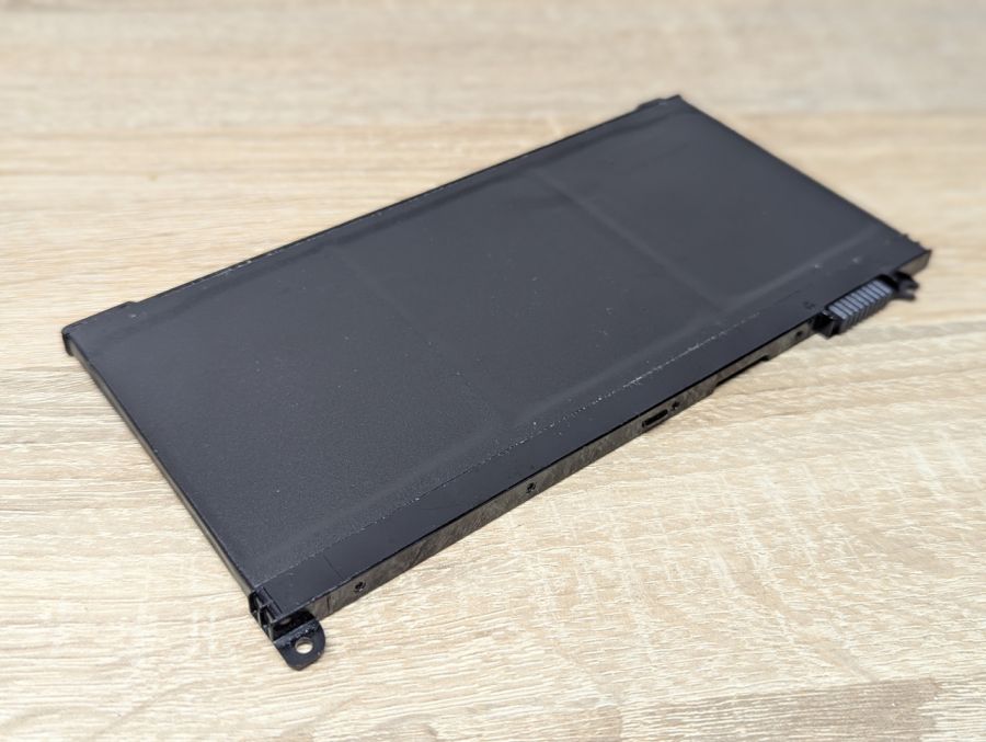 Б/В Оригінальна акумуляторна батарея HP RR03XL