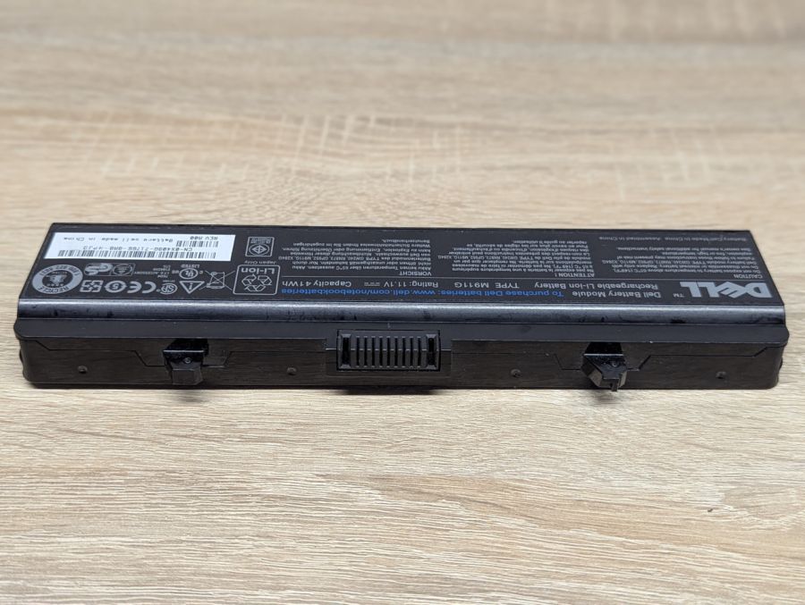 Б/В Оригінальна акумуляторна батарея Dell M911G
