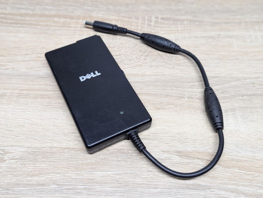 Б/В Оригінальна авто зарядка для ноутбука DELL model DA65NS3-00