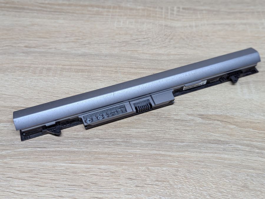 Б/В Оригінальна акумуляторна батарея HP RA04XL