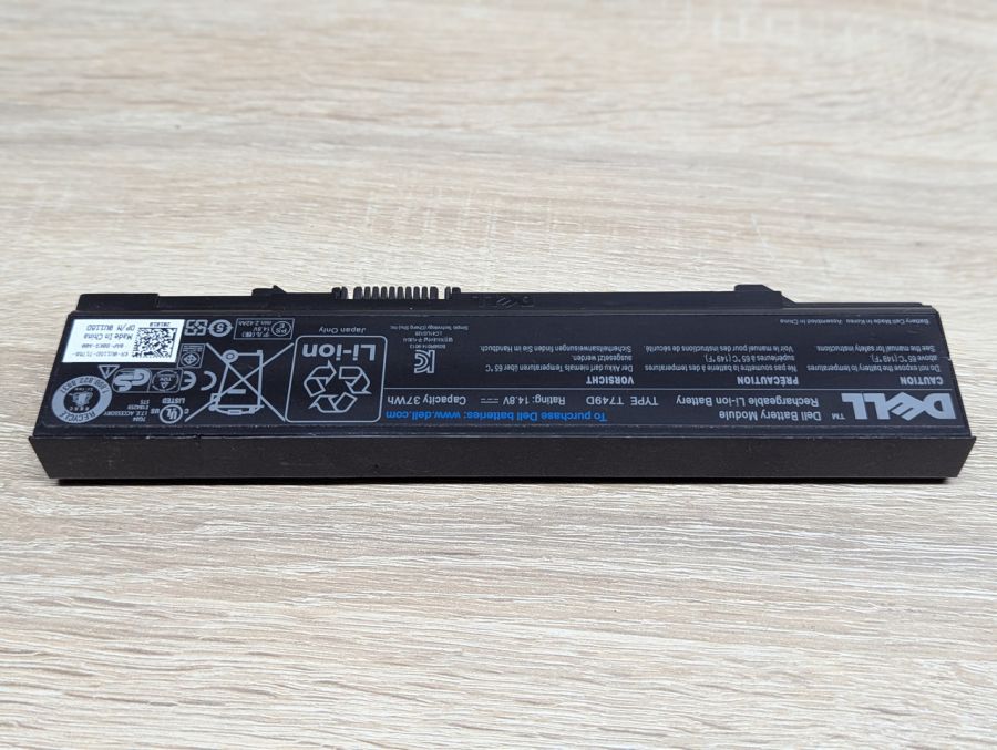 Б/В Оригінальна акумуляторна батарея Dell T749D E5400