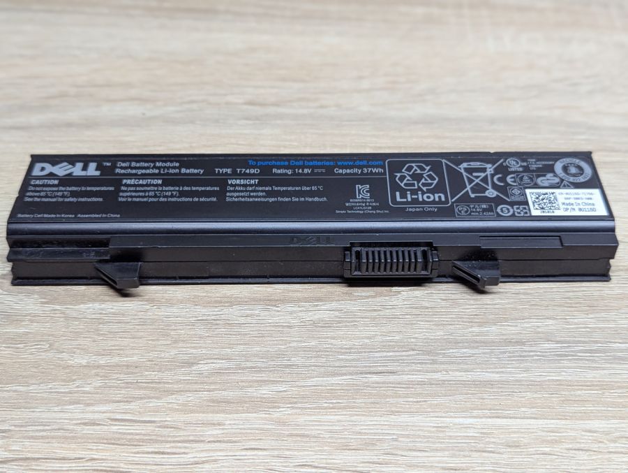 Б/В Оригінальна акумуляторна батарея Dell T749D E5400