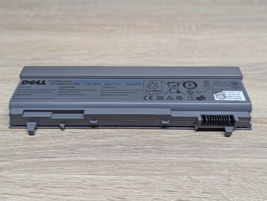 Б/В Оригінальна акумуляторна батарея Dell 4M529