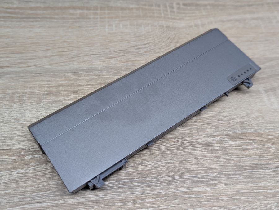 Б/В Оригінальна акумуляторна батарея Dell 4M529