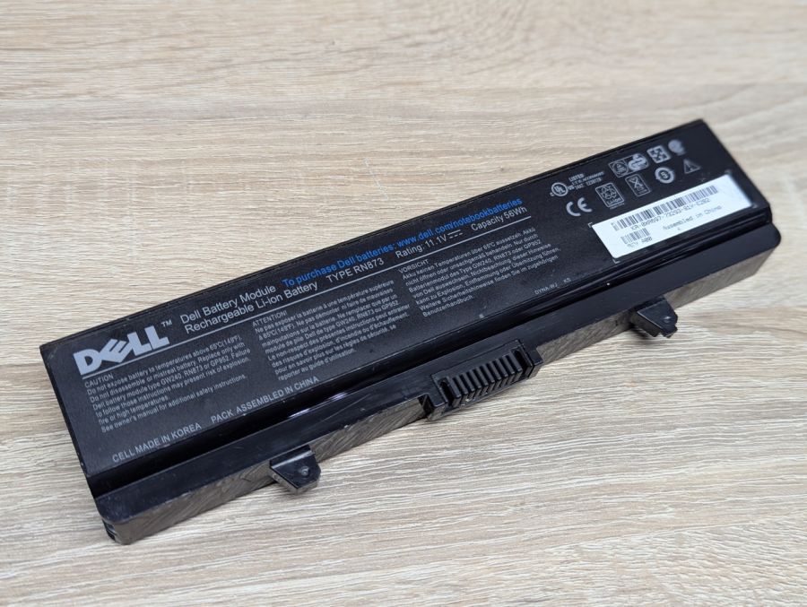 Б/В Оригінальна акумуляторна батарея Dell RN873