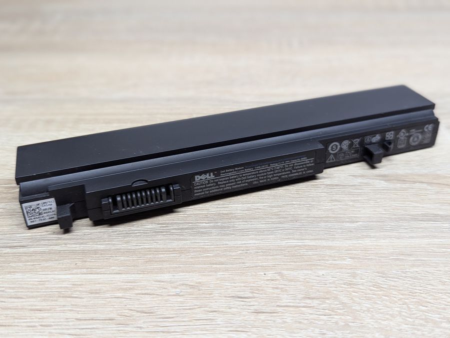 Б/В Оригінальна акумуляторна батарея Dell U011C