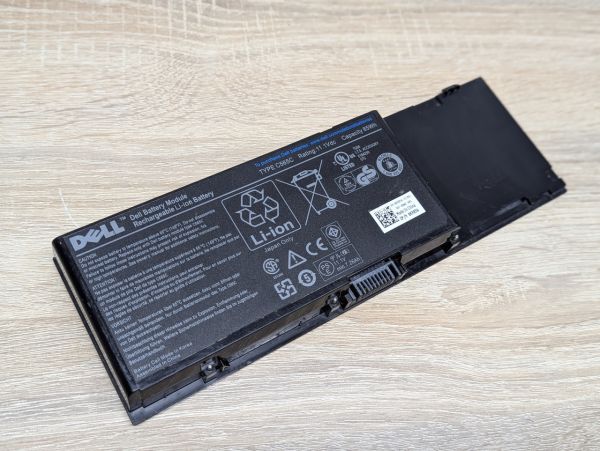 Б/В Оригінальна акумуляторна батарея Dell C565C