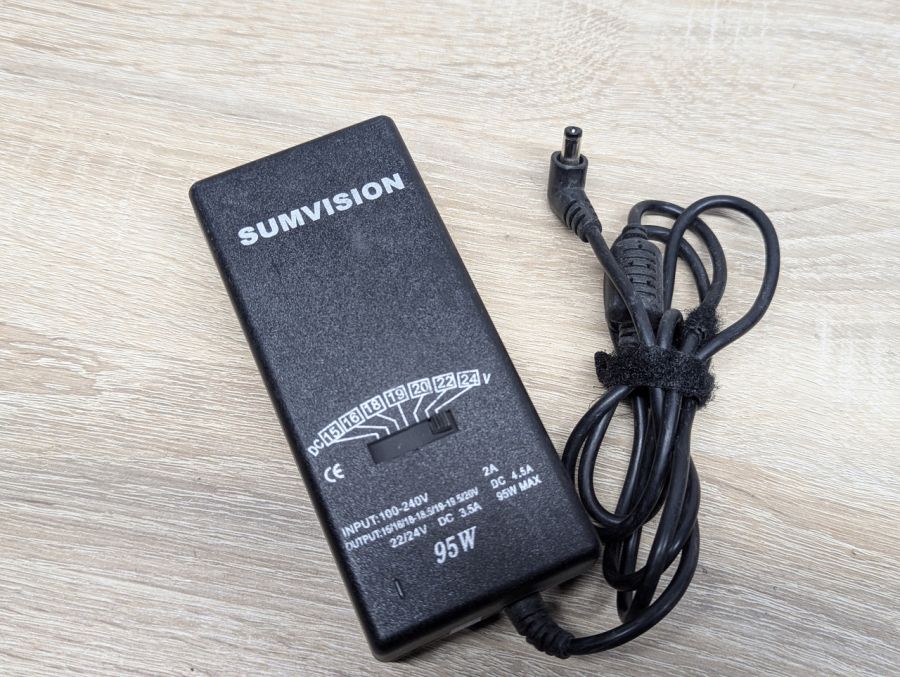 Б/В Універсальний блок живлення Sumvision LC-UNI-095SV,95 Вт,15В–24В,5.5 х 2.1 мм