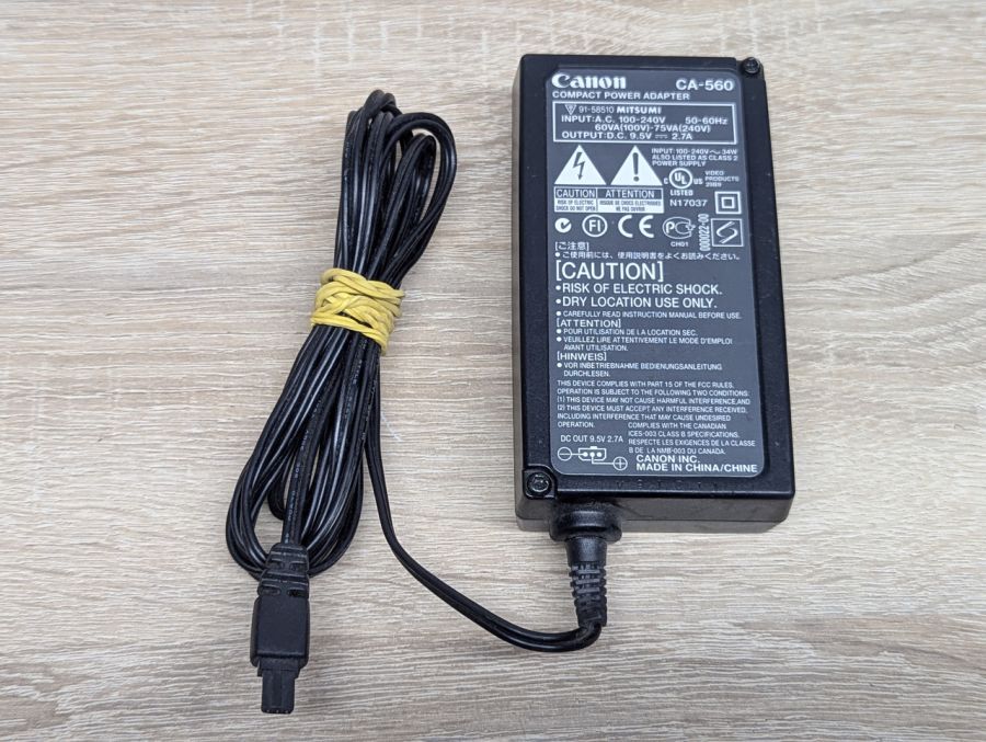Б/В Блок живлення Canon CA-560,25.65 Вт, 9.5 В,2.7 А,3 Pin